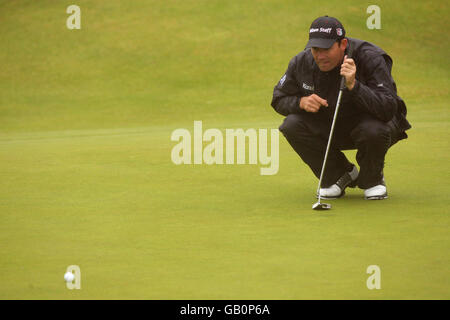 Republic of Ireland's Padraig Harrington lines up a putt during Round One of the Open Championship at the Royal Birkdale Golf Club, Southport. Stock Photo