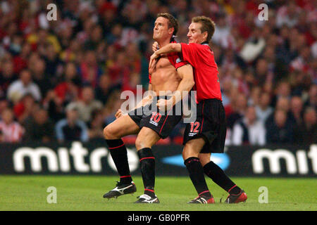 AFC Bournemouth's Steve Fletcher (l) celebrates scoring the opening goal with teammate Garreth O'Connor Stock Photo