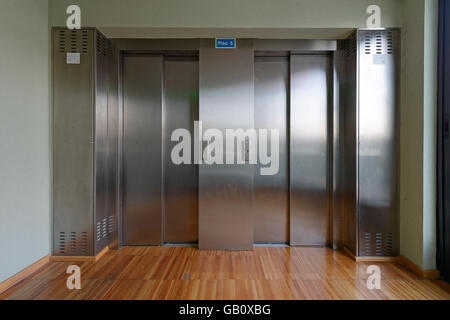 Two metallic elevator doors Stock Photo