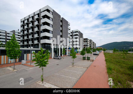 Apartment buildings with free parking spaces in front Stock Photo