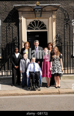 Prime Minister Gordon Brown, Sarah Brown and Natasha Kaplinsky meet the five finalists of 'Britain's Kindest Kids' (From left to right) Tara Ifill, 14 from Bermondsey in London, Charlie Doherty, 8 from Crawley in West Sussex, Liam Fairhurst, 12 from Bury St Edmunds, Kirsty Turnbull, 15 from Aviemore in Scotland, Daniella Jacobson, 12 from Elstree in London pictured during a photocall at 10 Downing Street, central London. Stock Photo