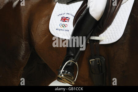 The boot of Great Britain's Kristina Cook on Miners Frolic during the dressage test on the first day of the Beijing Olympics held at the Shatin Equestrian centre Stock Photo