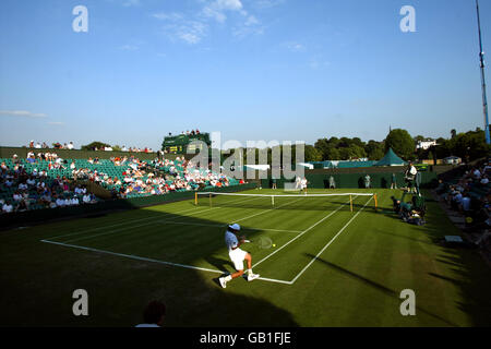 Tennis - Wimbledon 2003 - Men's First Round - Sebastian Grosjean v Thomas Enqvist Stock Photo