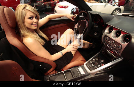 A model sits in an Alfa Romeo Spider on display at the 2008 British International Motor Show at the Excel Centre, London. Stock Photo