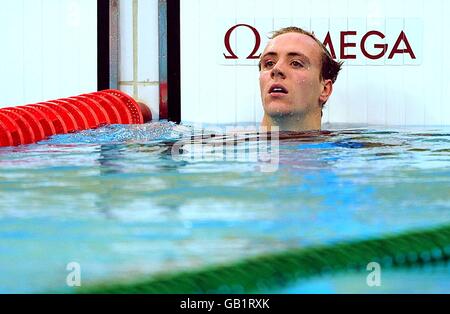 Great Britain's Robbie Renwick awaits his time after the Men's 200m Freestyle Semi Final 2 on the third day at the National Aquatics Center during the 2008 Olympic Games in Beijing. Stock Photo