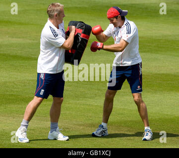 Cricket - England Nets - Edgbaston. England captain Michael Vaughan boxes a pad held by coach Peter Moores during a nets practice session at Edgbaston, Birmingham. Stock Photo