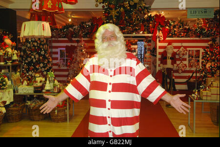 Father Christmas arrives to launch Christmas World at Harrods department store in west London. Stock Photo