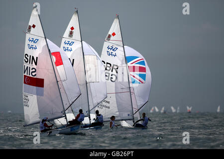 Great Britain's 470 women, Christina Bassadone and Saskia Clark, run down to the leeward gate during the opening rounds of their event at the 2008 Beijing Olympic Games' Sailing Centre at Qingdao, China. Stock Photo