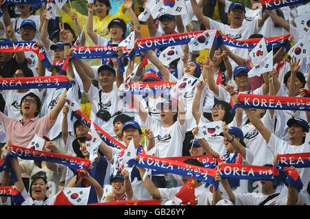 Olympics - Beijing Olympic Games 2008 - Day One. Korea Archery fans at the Beijing Olympic Green Archery Field Stock Photo