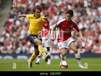 Arsenal's Samir Nasri and West Bromwich Albion's Marek Cech (left) Albion battle for the ball Stock Photo