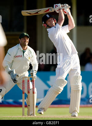 England's Paul Collingwood hits a six watched by Mark Boucher to bring up his century during the Third Test match at Edgbaston, Birmingham. Stock Photo