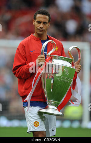 Soccer - Friendly - Manchester United v Juventus - Old Trafford. Manchester United's Rio Ferdinand with the Champions League Trophy Stock Photo