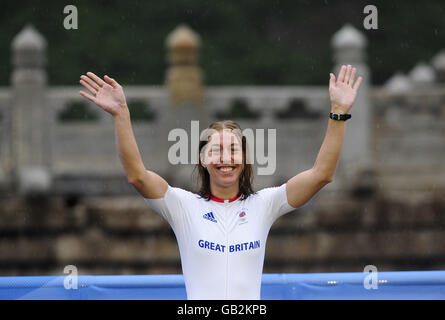 Nicole Cooke celebrates following her victory in the Women's Road Race at the Beijing Olympics. Stock Photo