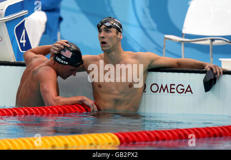 United States' Michael Phelps (r) celebrates victory in the men's 200m Individual Medley final with teammate and bronze medalist Ryan Lochte (l). Stock Photo