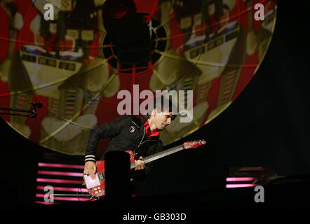 Matthew Bellamy of Muse performing on the second day of the V Festival at Hylands Park, Chelmsford. Stock Photo
