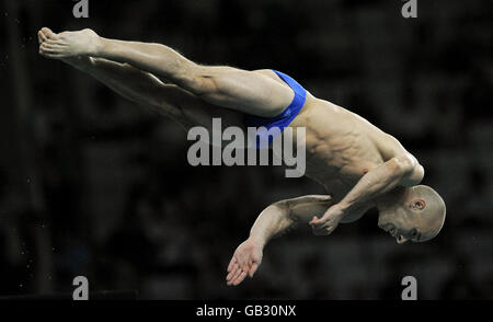 Great Britain's Peter Waterfield dives in the Men's 10m platform at the National Aquatics Centre in Beijing, China. Stock Photo