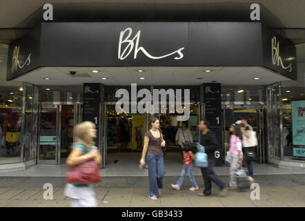 General view of shoppers walking past a British Home Stores (BHS) shop on Oxford Street in London. Stock Photo