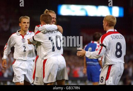 England's Michael Owen is congratulated after scoring Stock Photo