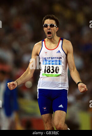 Great Britain's Martyn Rooney celebrates finishing second in his 400m heats at the National Stadium in Beijing during the 2008 Beijing Olympic Games. Stock Photo