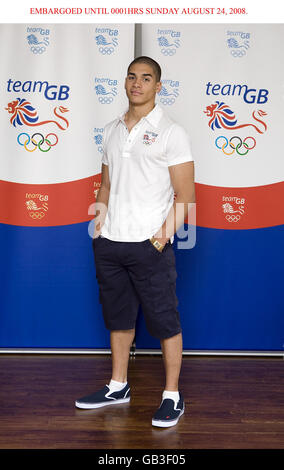 Olympic Team GB member Louis Smith models the closing ceremony parade wear to be worn by the British Team during the 2008 Beijing Olympics Games in China, during a photo call at the Century Club in London. Stock Photo