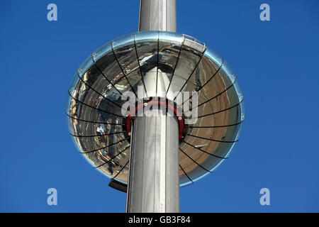 Looking up at Brighton’s new i360 moving observation tower, showing the underneath reflecting the Brighton seafront. Stock Photo