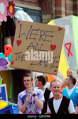 Participants walk down Deansgate during Manchester's annual gay Pride parade, Manchester. Stock Photo