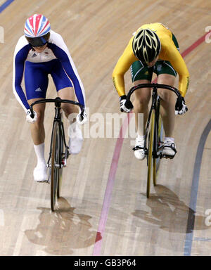 Great Britain's Victoria Pendleton (left) pedals for gold alongside Australia's Anna Meares during the Women's Sprint Final at the Laoshan Velodrome during the 2008 Beijing Olympic Games in China. Stock Photo