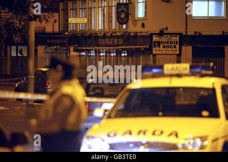 Two men gunned down in pub shooting Stock Photo