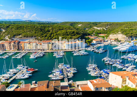 BONIFACIO PORT, CORSICA ISLAND - JUN 24, 2015: View of Bonifacio port with colorful houses and boats, Corsica island, France. Stock Photo