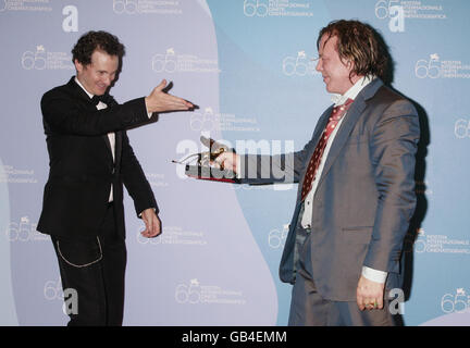 AP OUT: Mickey Rourke (right) with director Darren Aronofsky, who won the Golden Lion Award for the Best Film, 'The Wrestler', during the closing night ceremony of the festival, at the Palazzo del Casino on Venice Lido, Italy. Stock Photo