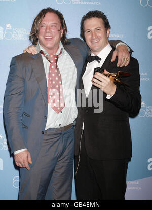 AP OUT: Mickey Rourke (left) with director Darren Aronofsky, who won the Golden Lion Award for the Best Film, 'The Wrestler', during the closing night ceremony of the festival, at the Palazzo del Casino on Venice Lido, Italy. Stock Photo