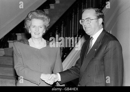 Prime Minister Margaret Thatcher is greeted by Belgian Prime Minister Wilfried Martens, at a reception in Bruges, Belgium. Stock Photo