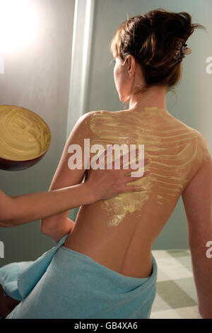 Woman, 35, having an Aphrodite massage from whey, Thalasso therapy in a spa resort Stock Photo