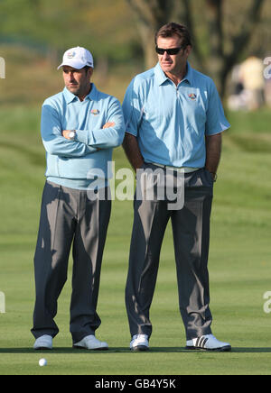 Ryder Cup Captain Nick Faldo (right) watches with his assistant Jose Maria Olazabal the team practise at Valhalla Golf Club, Louisville, USA. Stock Photo