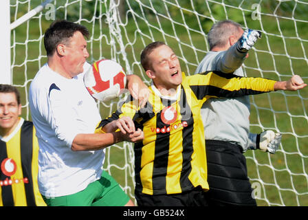 TO PREVIOUSLY ISSUED IMAGE Schools Secretary Ed Balls (left) with PA reporter Jack Doyle, take part in a football match between MPs and the media at Manchester United's training ground, ahead of the second day of the 2008 Labour Party Conference in Manchester. Stock Photo