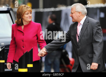 Transport Minister Ruth Kelly accompanied by her husband, Derek Gadd, outside the Manchester Central, on her way to addressing the Labour Party conference in Manchester. Stock Photo