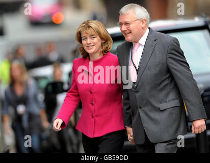 Transport Minister Ruth Kelly accompanied by her husband, Derek Gadd, outside the Manchester Central, on her way to addressing the Labour Party conference in Manchester. Stock Photo