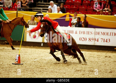 A competitor during the Diamond Jubilee Cup Pony Mounted games during day two of the Horse of the Year Show at the NEC in Birmingham. Stock Photo