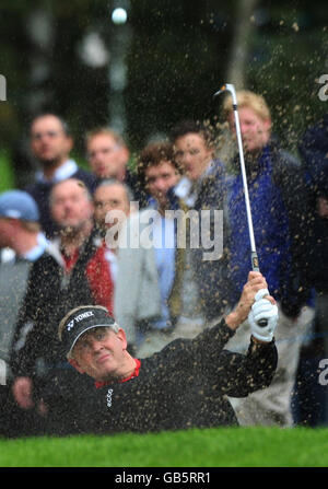 Scotland's Colin Montgomerie chips out of the bunker on the 5th during the Quinn Insurance British Masters at The Belfry, Wishaw, Sutton Coldfield. Stock Photo
