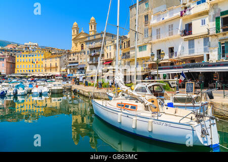 BASTIA PORT, CORSICA ISLAND - JUL 4, 2015: sailing boat in Bastia port on sunny summer day. Corsica is a French island and is ve Stock Photo