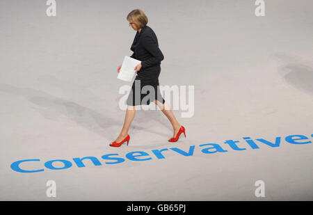 Commons Leader for the Conservative Party Theresa May arrives on the platform at the Conservative Party conference in Birmingham today where she addressed delegates. Stock Photo