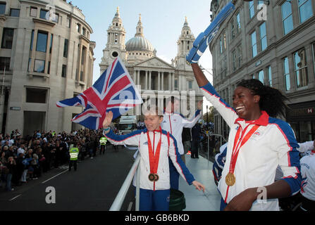British Olympic athletes Christine Ohuruogu (right) and Hazel Simpson (left) take part in the Team GB Olympic parade through the streets of London. Stock Photo