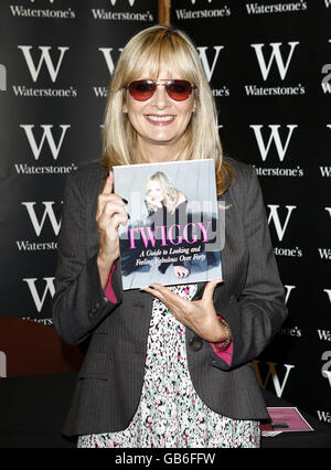 Twiggy signs copies of her new book, 'A Guide to Looking and Feeling Fabulous Over 40,' at Waterstone's on Oxford Street in central London. Stock Photo