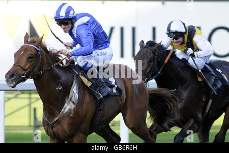 Heaven Knows and Richard Hills win The David & Toni Eyles Handicap Stake at Ascot Racecourse, Berkshire. Stock Photo