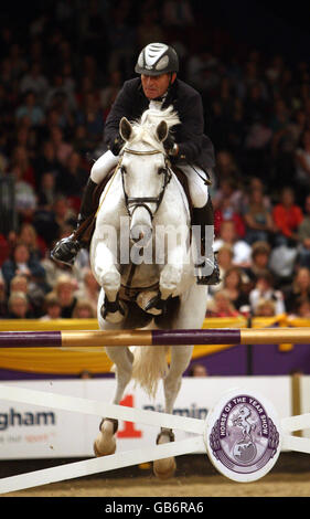 Netherland's Jurgen Stenfert riding BMC Naomie competes in the Bob Hurford Memorial Cup during day four of the Horse of the Year Show at the NEC in Birmingham. Stock Photo