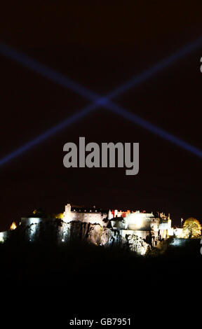 Lights in the form of a saltire project above Stirling Castle and the Wallace monument at the launch of the Scottish Poppy Appeal. Stock Photo