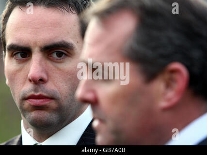 Shadow Defence Secretary Liam Fox (right) with Maurice Golden, Conservative by-election candidate for Glenrothes, at the War Memorial in Markinch, where they were promoting the X-Factor single Hero. Stock Photo