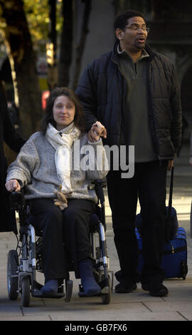 Multiple sclerosis sufferer Debbie Purdy, 45, from Bradford, and her husband, Cuban violinist Omar Puente, arrive at the High Court, where she lost her landmark legal bid to clarify the law on assisted suicide. Stock Photo