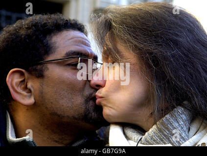 Multiple sclerosis sufferer Debbie Purdy, 45, from Bradford, and her husband, Cuban violinist Omar Puente, at the High Court, after she lost her landmark legal bid to clarify the law on assisted suicide. Stock Photo