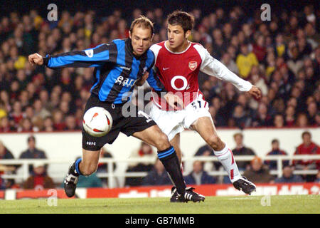 (L-R) Rotherham United's Paul Warne and Arsenal's Francese Fabregas battle for the ball Stock Photo